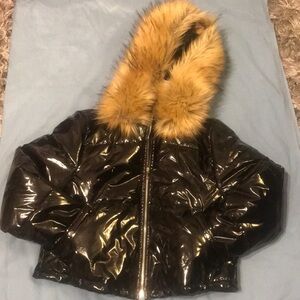 Brand new never worn black shiny puffer jacket with fur hood